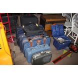 A large quantity of various suitcases