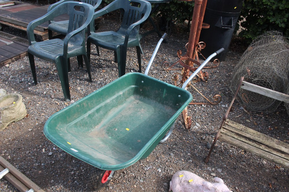 A plastic and metal wheelbarrow