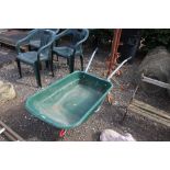 A plastic and metal wheelbarrow