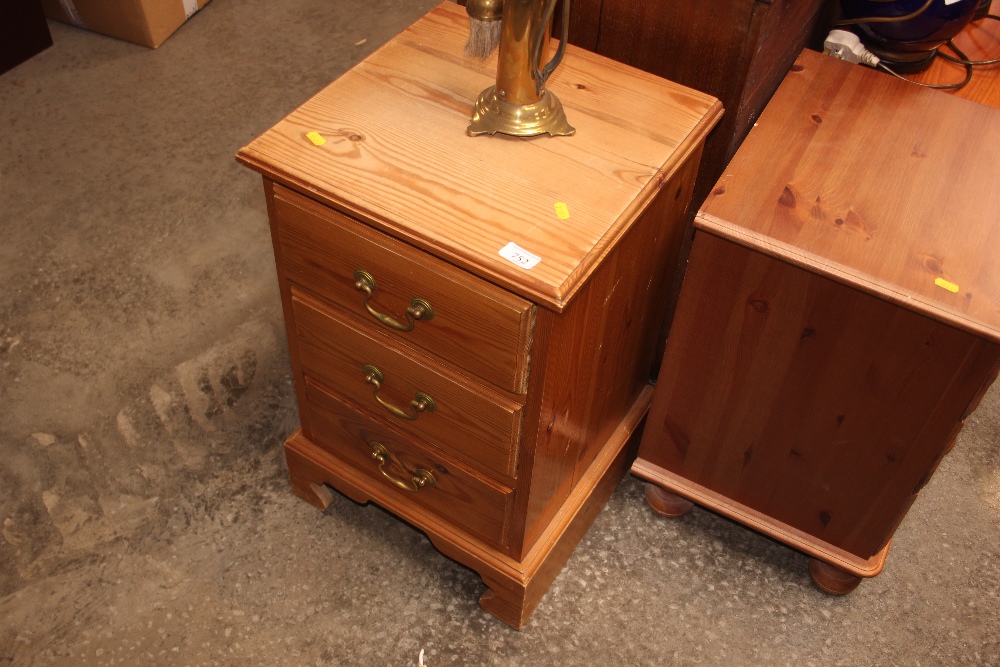 A pine bedside chest fitted three drawers