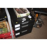 A filing chest fitted three drawers