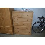 A stripped pine chest fitted two short over four l
