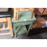 A green painted table fitted single drawer