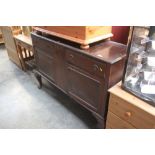 A mahogany sideboard raised on claw and ball suppo