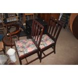 A pair of mahogany dining chairs