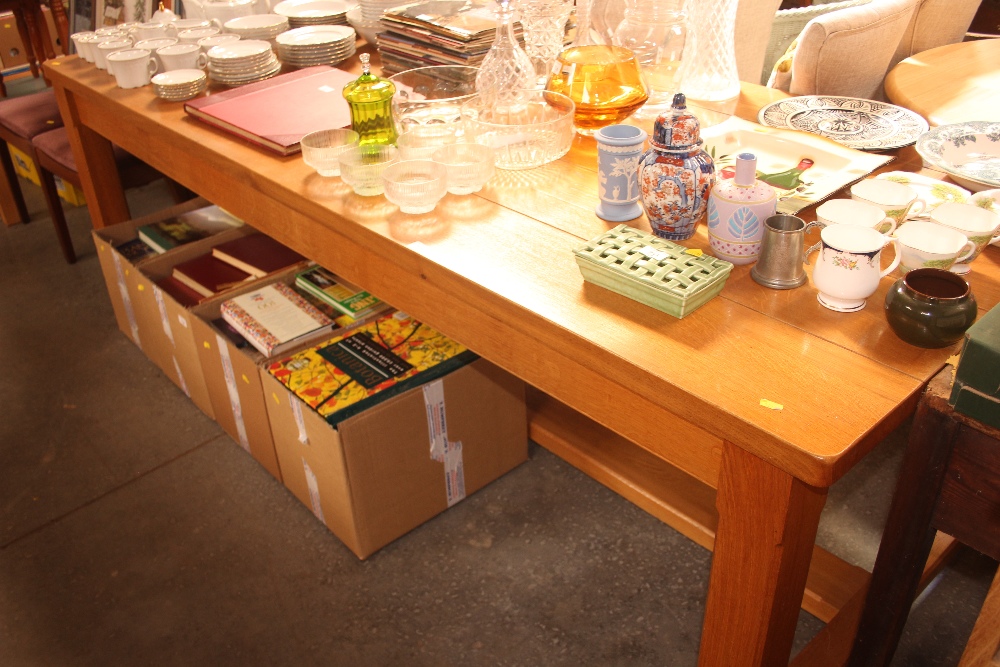 A large oak refectory style dining table