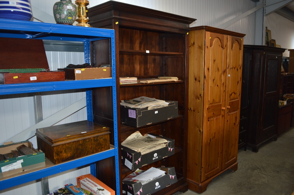 A large oak open fronted bookcase