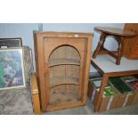 A 19th Century pine barrel back corner cupboard