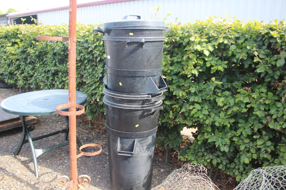 A quantity of plastic bins and lids