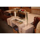 A dressing table fitted seven drawers