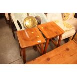A pair of wooden stools