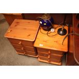 Two pine three drawer bedside chests