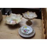 Two floral decorated dishes and a floral decorated