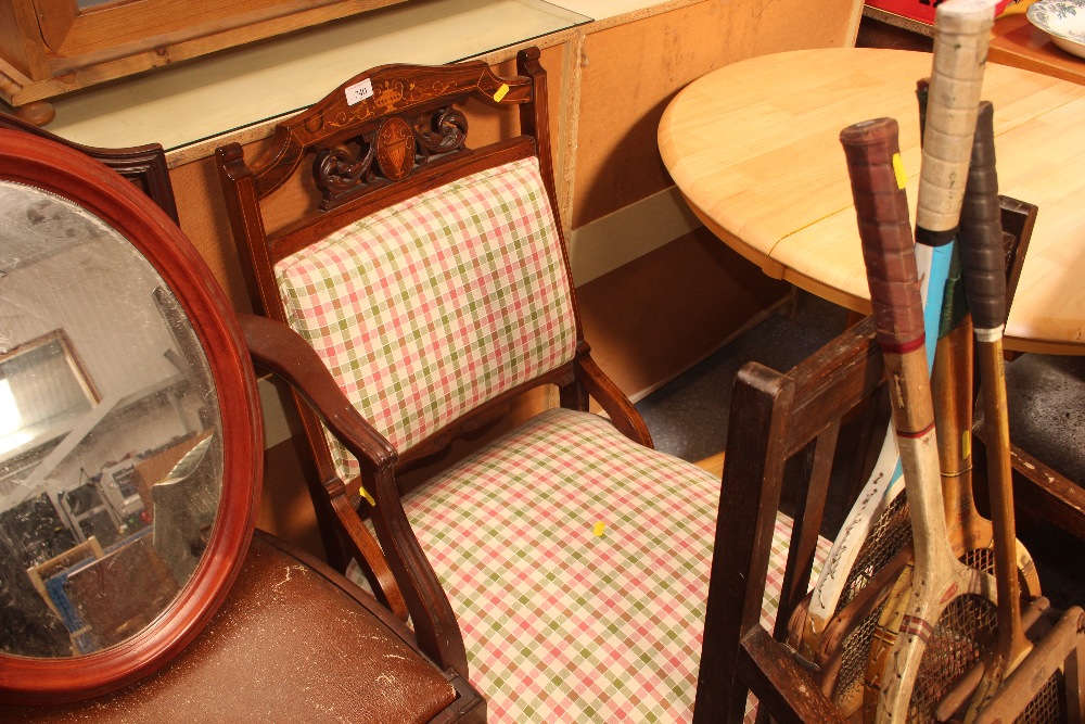 A late Victorian rosewood inlaid nursing chair