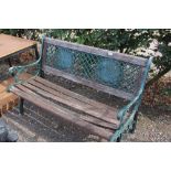 A wooden and metal garden bench
