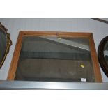 A pine framed oblong wall mirror