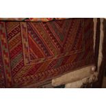 An approximate 4'2" x 3'9" Gazak rug