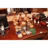A quantity of copper vases and ewers and other sil