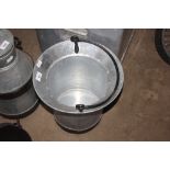 A galvanised swing handled pail (32)