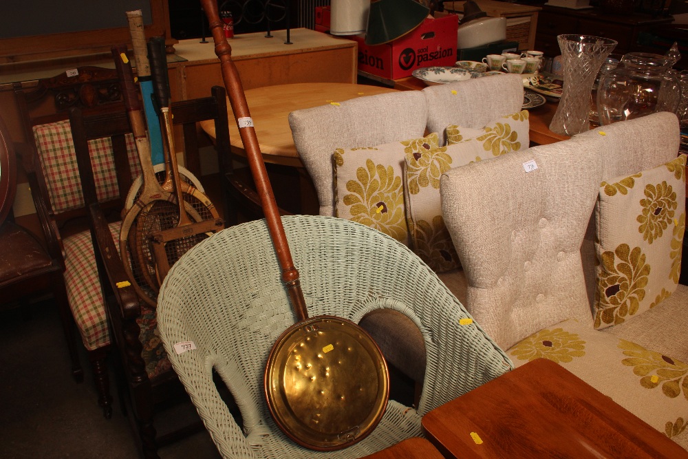 A brass and copper bed warming pan with turned han