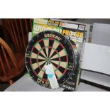 A Winmau dart board
