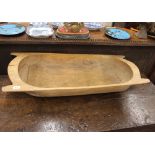 An Antique rustic wooden dough trough, 97cm long