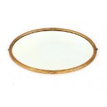 A 19th Century oval gilt framed wall mirror, having reeded border 57cm x 80cm