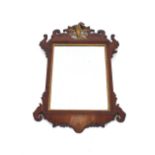 A 19th Century mahogany fret carved wall mirror, in the Chippendale manner, having gilt Ho Ho bird