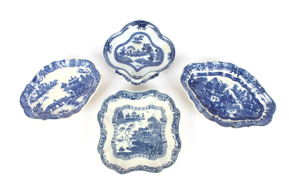 Four various 19th Century blue and white transfer printed serving dishes, all decorated in the