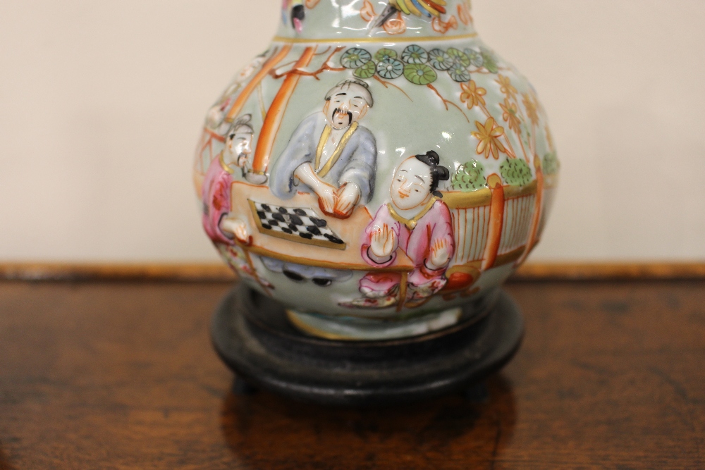 A Chinese baluster vase, with raised decoration of figures, flowers, butterflies and fish on celedon - Image 5 of 6