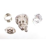 A heavy silver ring; a Scandinavian silver brooch, bears signature; heavy solid silver Indian