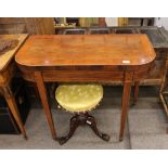 An early 19th Century mahogany rosewood cross banded and satinwood strung card table, the D shaped