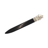 A Continental faux tortoiseshell and white metal mounted paper knife, having Viking ship mount, 19cm