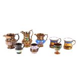 A quantity of various Victorian copper lustre jugs, mugs etc., (8)