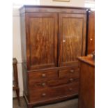A 19th Century mahogany linen press, converted to a hanging wardrobe, two short and two long