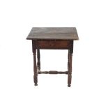 An Antique oak side table, fitted single drawer, raised on turned baluster supports united by