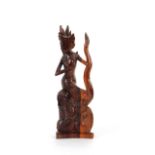 An oriental carved hardwood figure of a maiden with dragon, 36cm high
