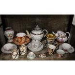 A Newhall teacup and saucer; a 19th Century Worcester teapot AF; a Wedgwood octagonal tea cup and