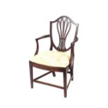 A Harlequin set of twelve 19th Century country Hepplewhite design dining chairs, having