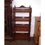 A Victorian mahogany four tier whatnot, fitted with a single drawer, raised gallery back having