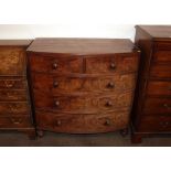 A 19th Century mahogany bow fronted chest, of two short and three long drawers raised on tunred
