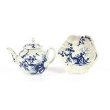 An 18th Century Worcester blue and white teapot and stand, "Prunus Root" decoration, workman's