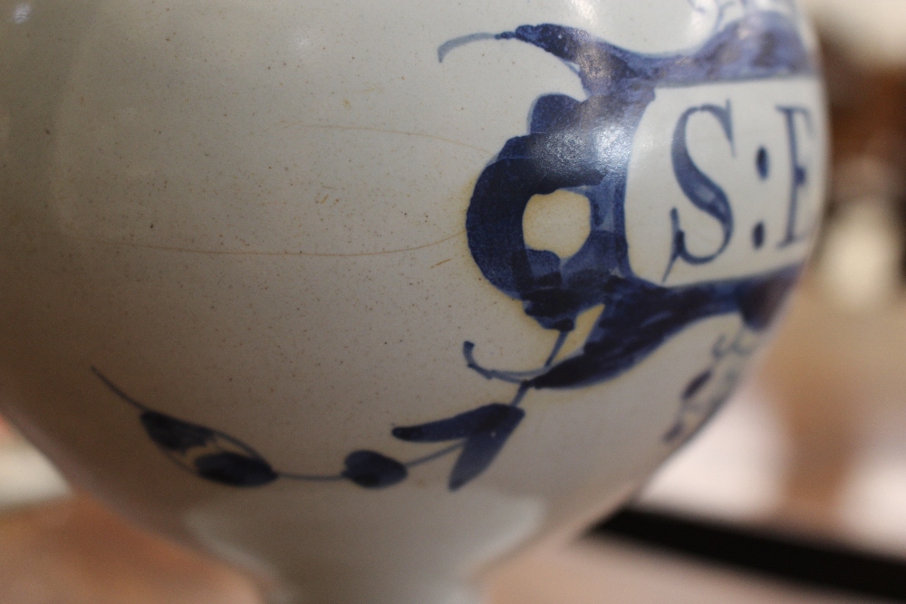 An 18th Century Delft wet drug jar, inscribed S:E.,SPIN:CERV.  having blue floral and cherub - Image 12 of 13