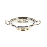 A Scottish silver strawberry dish, having pierced berry decoration flanked by loop angular