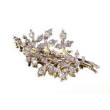 A 9 carat gold and diamond floral spray brooch, comprising 30 stones