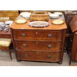A 19th Century mahogany bow fronted chest, fitted three long drawers and raised on bun feet, 114cm