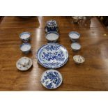 A Worcester fence patterned saucer, a Chinese blue and white plate; various tea bowls; continental