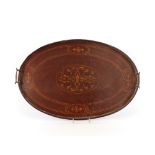 An Edwardian inlaid mahogany oval tea tray, with floral scroll decoration flanked by brass