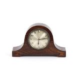 A 1930's oak cased mantel timepiece, 24.5cm long x 15cm high