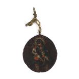 An Antique oval metalware double sided painted pendant, decorated with Madonna and child and
